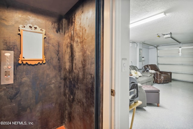 interior space featuring a textured ceiling