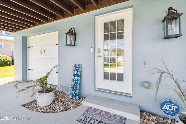 entrance to property with a garage