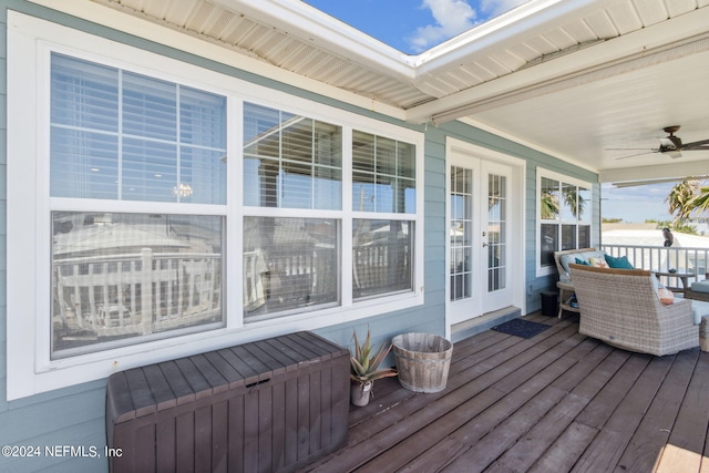 wooden deck with french doors and ceiling fan