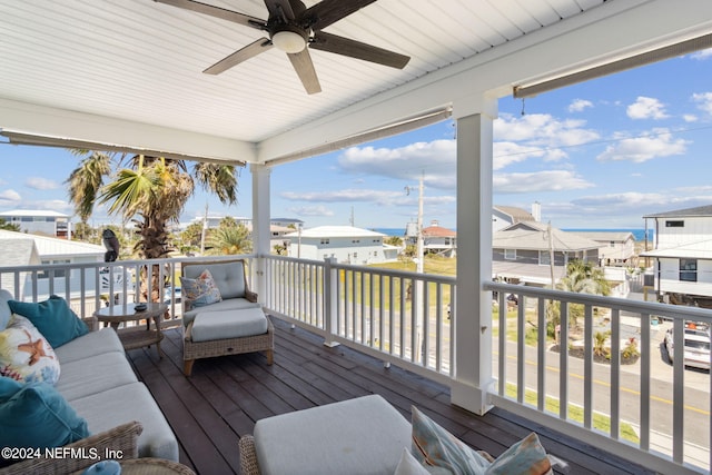 wooden deck featuring ceiling fan