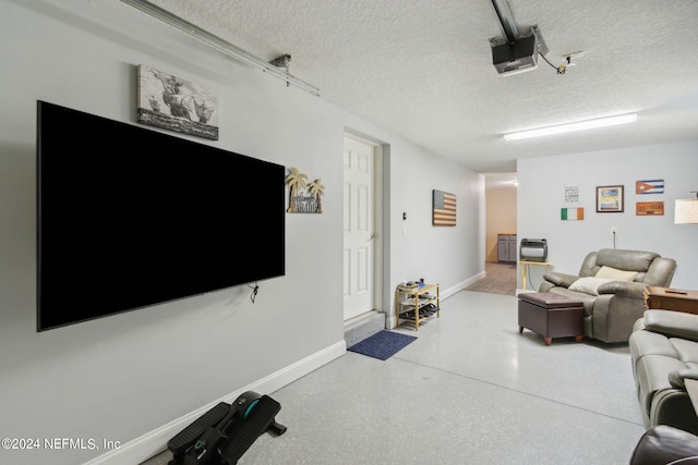 living room with a textured ceiling