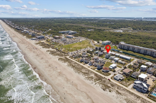 aerial view featuring a water view and a view of the beach