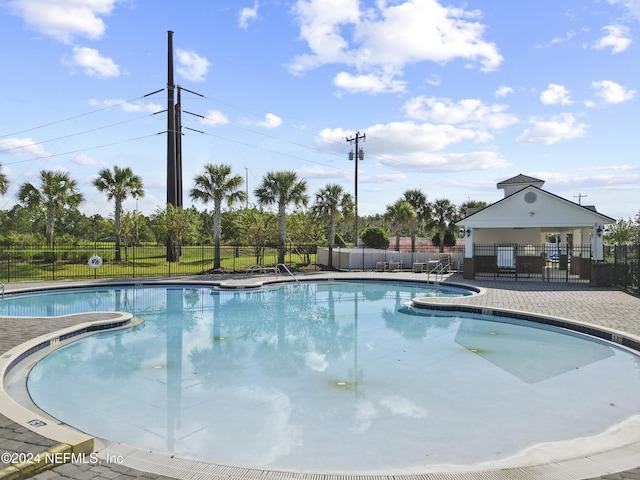 view of pool featuring a patio area