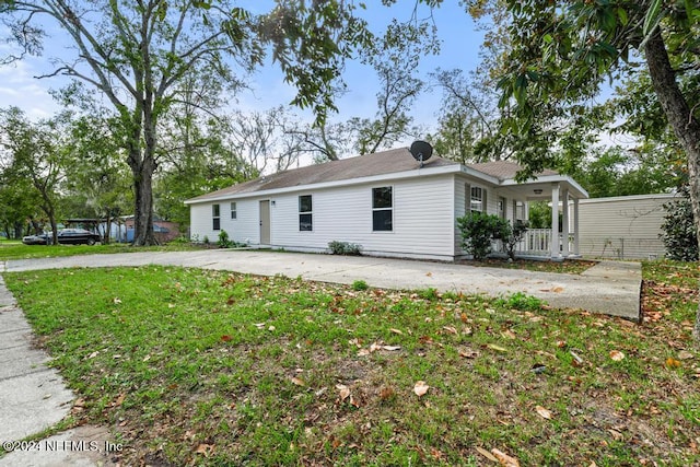 exterior space featuring a front lawn