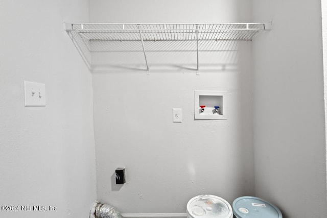 clothes washing area with hookup for a washing machine and hookup for an electric dryer