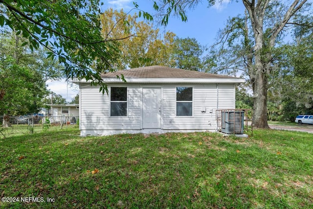 view of home's exterior featuring a yard and central air condition unit