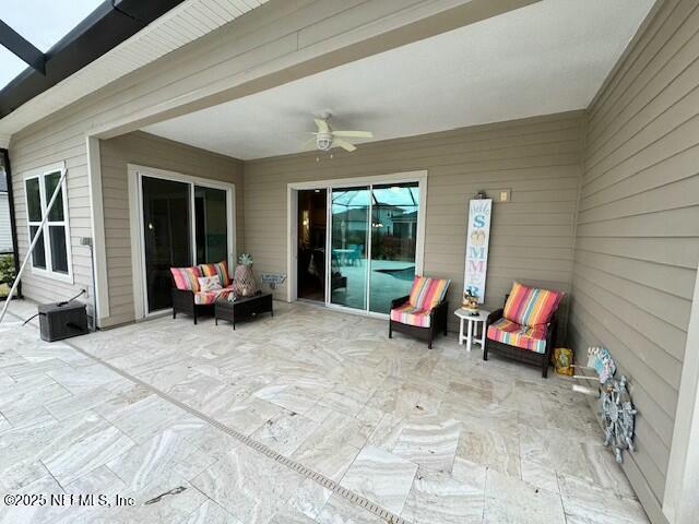 view of patio with ceiling fan