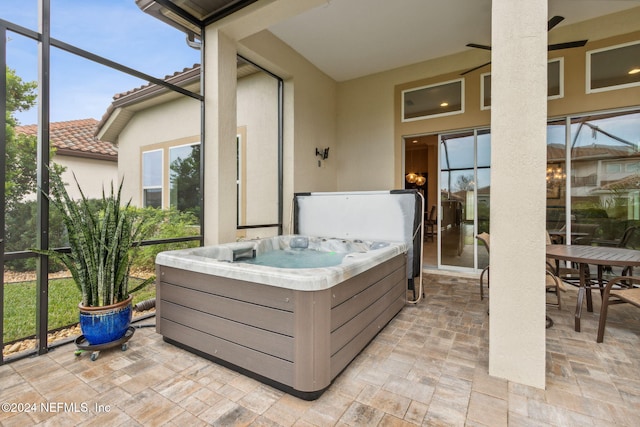 exterior space with a hot tub