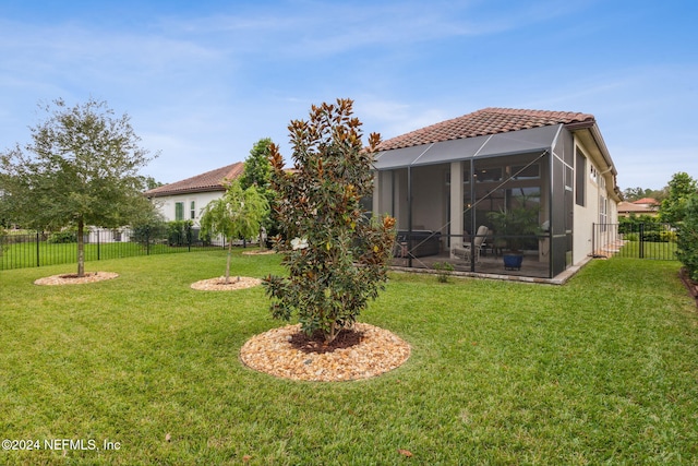 view of yard with a patio area and a lanai