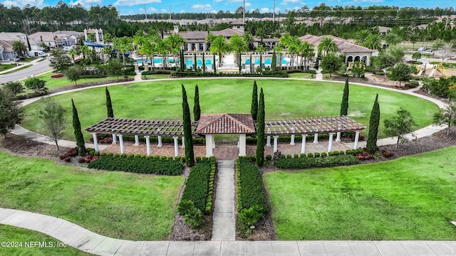 surrounding community with a gazebo, a pool, and a pergola