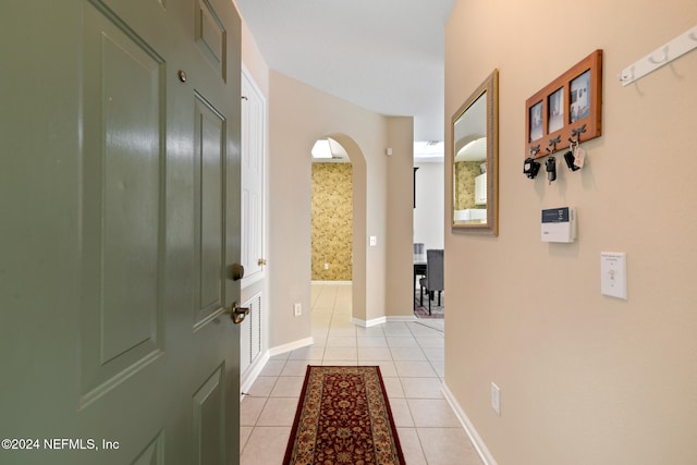 interior space featuring light tile patterned floors