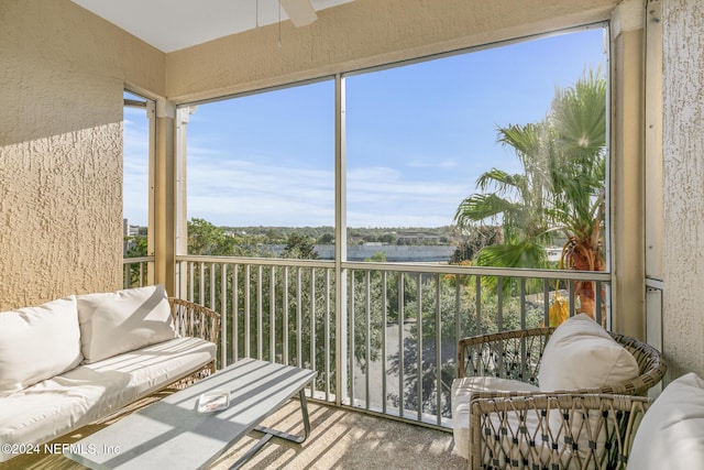 7801 Point Meadows Dr Unit 8406, Jacksonville, FL 32256 - sunroom / solarium with a water view, plenty of natural light, and a textured wall