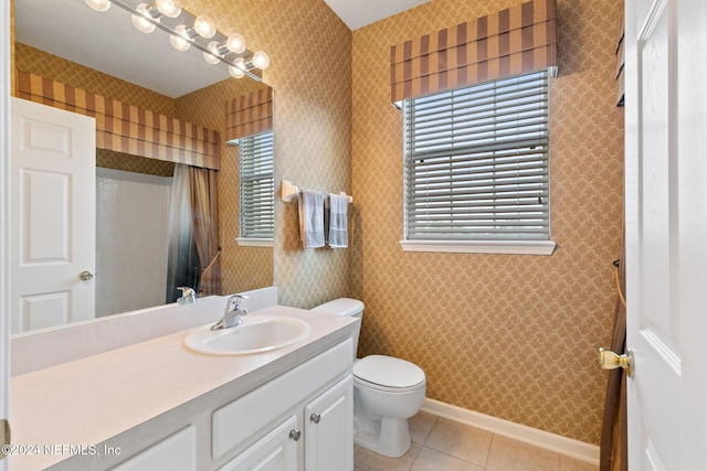 7801 Point Meadows Dr Unit 8406, Jacksonville, FL 32256 - full bathroom with toilet, baseboards, walk in shower, tile patterned floors, and vanity