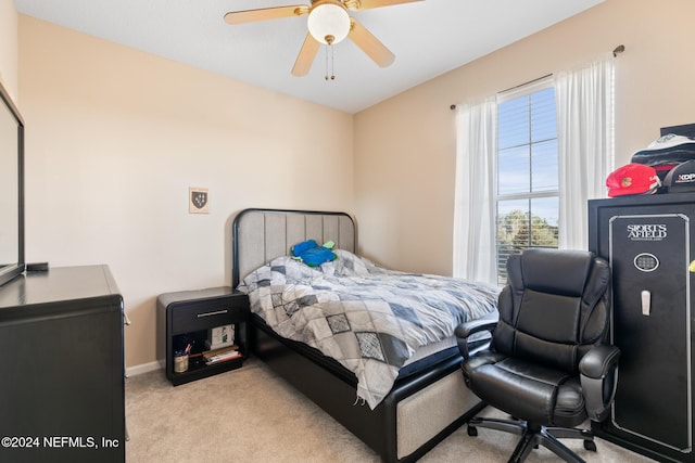 7801 Point Meadows Dr Unit 8406, Jacksonville, FL 32256 - carpeted bedroom featuring baseboards and a ceiling fan