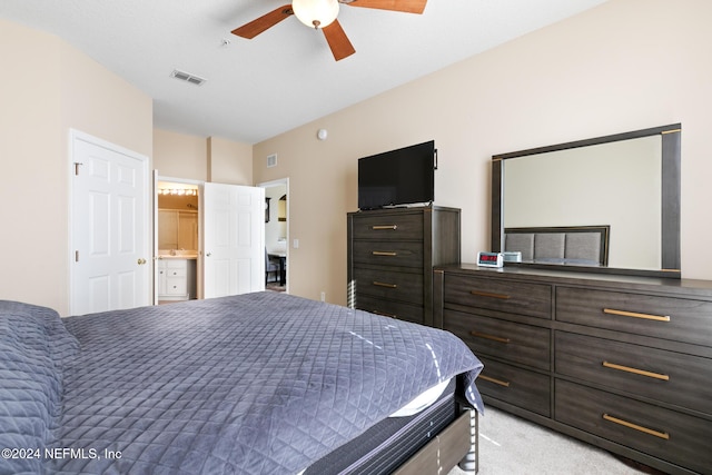 7801 Point Meadows Dr Unit 8406, Jacksonville, FL 32256 - bedroom featuring a ceiling fan, connected bathroom, visible vents, and light colored carpet