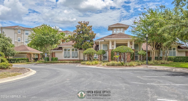 7801 Point Meadows Dr Unit 8406, Jacksonville, FL 32256 - view of property featuring uncovered parking
