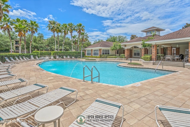 7801 Point Meadows Dr Unit 8406, Jacksonville, FL 32256 - community pool with a patio
