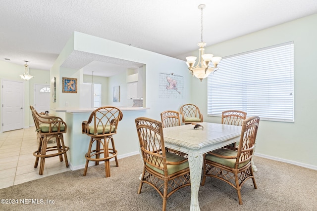 193 Lions Gate Dr, Saint Augustine, FL 32080 - dining space featuring a chandelier, light carpet, and plenty of natural light