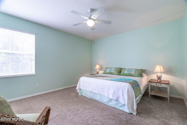 193 Lions Gate Dr, Saint Augustine, FL 32080 - carpeted bedroom featuring a textured ceiling, baseboards, and a ceiling fan