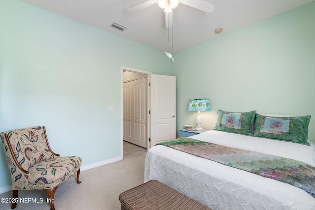 193 Lions Gate Dr, Saint Augustine, FL 32080 - carpeted bedroom with baseboards, a ceiling fan, and a textured ceiling