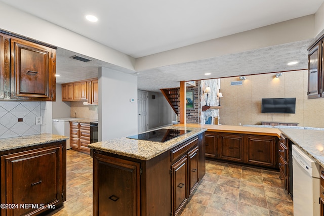 kitchen featuring tasteful backsplash, black electric stovetop, a textured ceiling, dark brown cabinetry, and white dishwasher