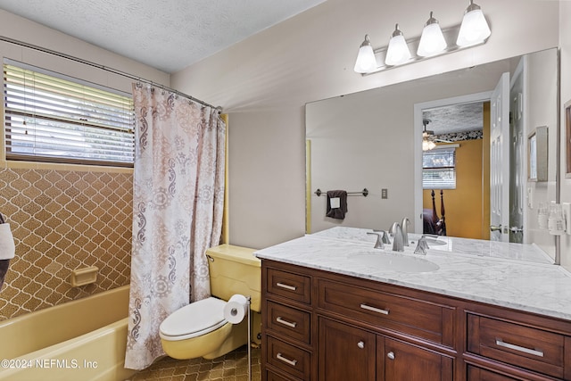 full bathroom featuring a wealth of natural light, vanity, toilet, and shower / tub combo