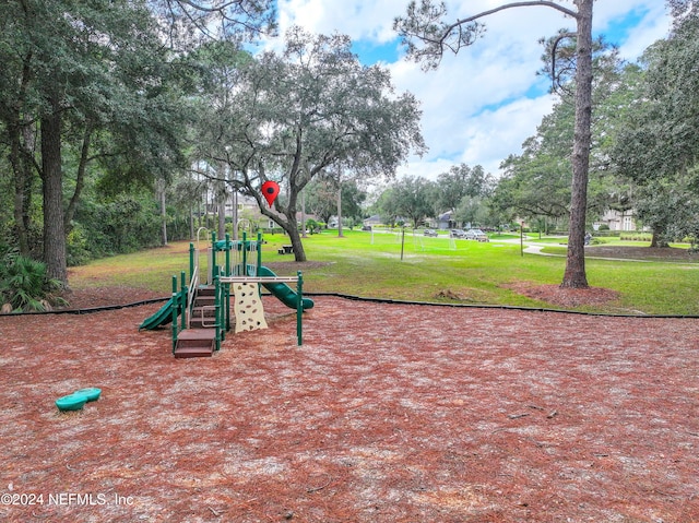 view of play area featuring a yard