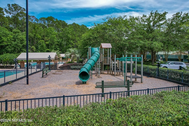 view of play area with a community pool