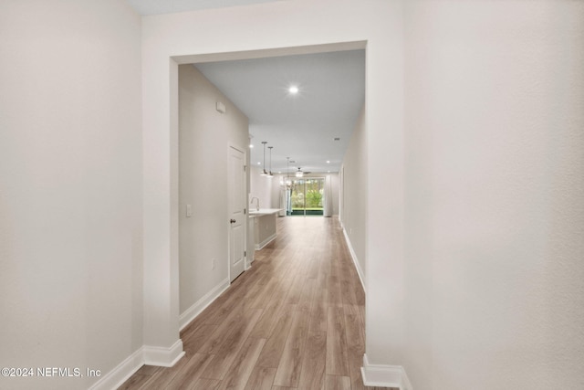 hallway featuring light hardwood / wood-style floors