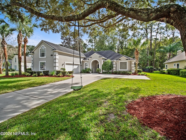 view of front facade featuring a front yard