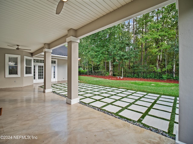 view of patio featuring ceiling fan