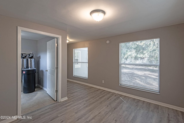 unfurnished room featuring light wood-type flooring