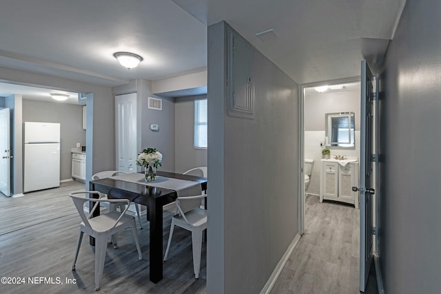 dining area with light wood-type flooring