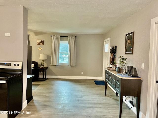 1425 Domas Dr, Jacksonville, FL 32211 - living area featuring wood finished floors and baseboards