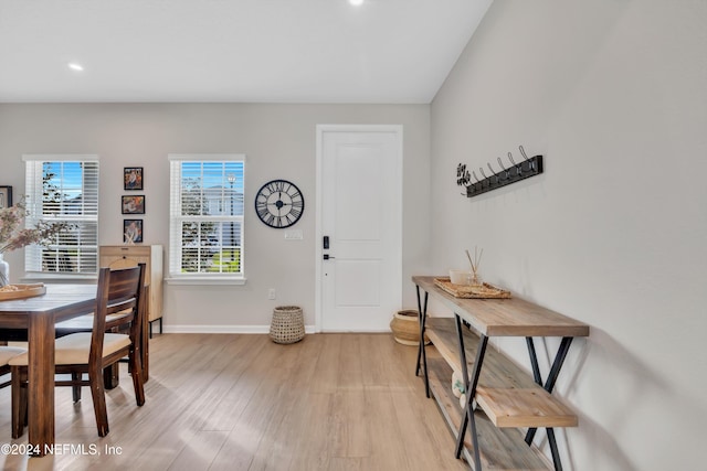 entryway with light hardwood / wood-style floors