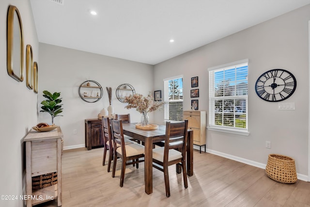 dining area with light wood-type flooring