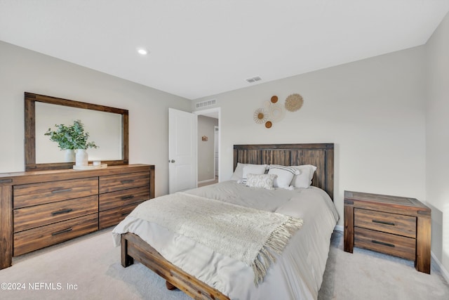 bedroom with light carpet