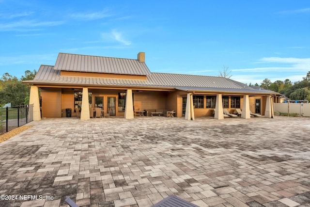 rear view of property with a patio area