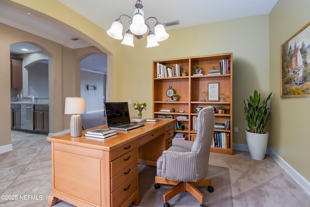 tiled home office with a chandelier and ornamental molding