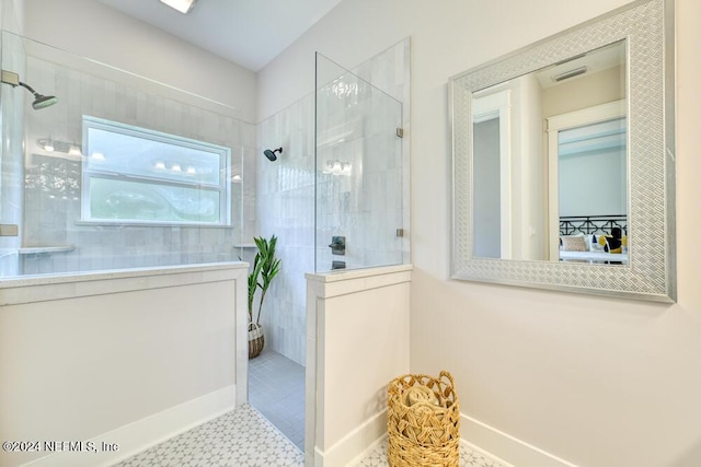 bathroom featuring tiled shower