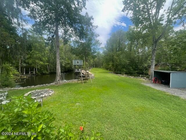 view of yard with a water view