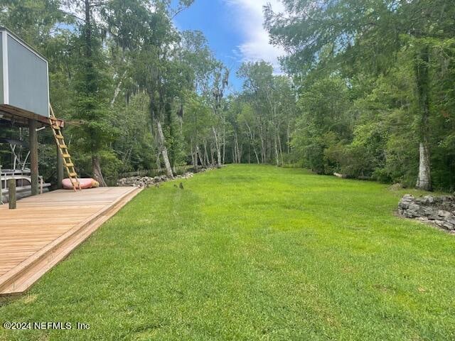 view of yard featuring a deck