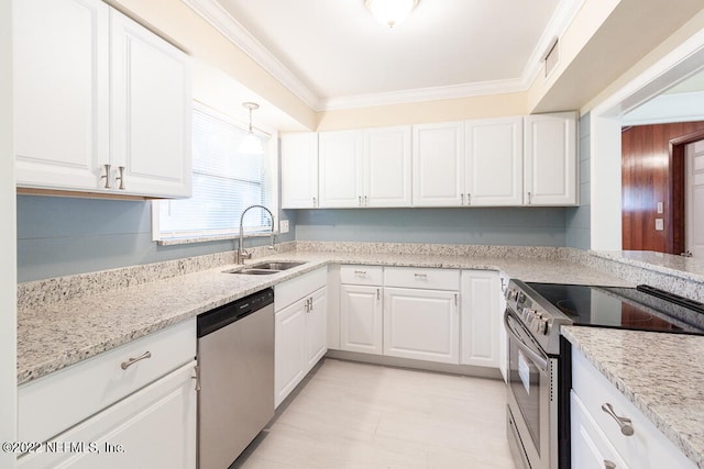 kitchen featuring white cabinetry, appliances with stainless steel finishes, ornamental molding, and sink