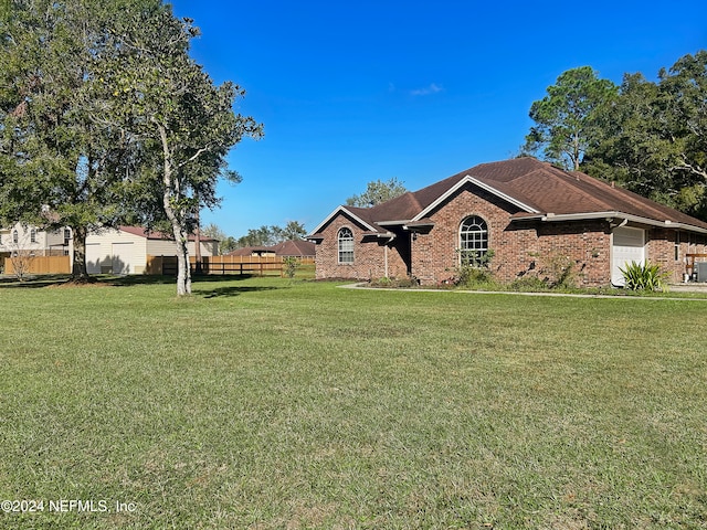 view of front of home with a front yard