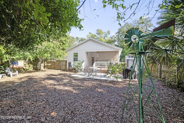 back of house with a patio area