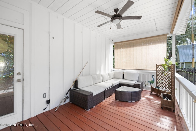 wooden terrace featuring ceiling fan