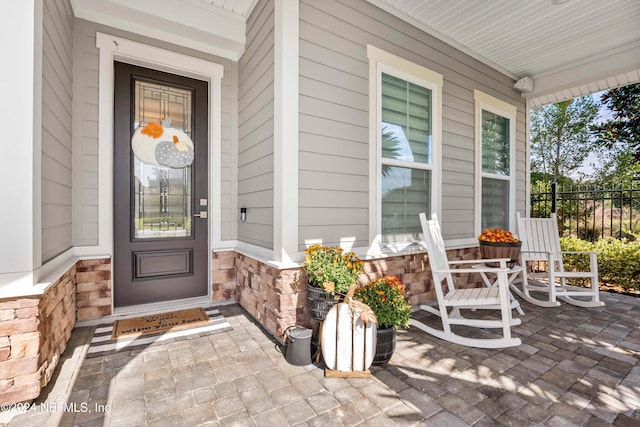 property entrance with a porch