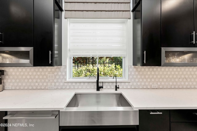 kitchen with sink and decorative backsplash