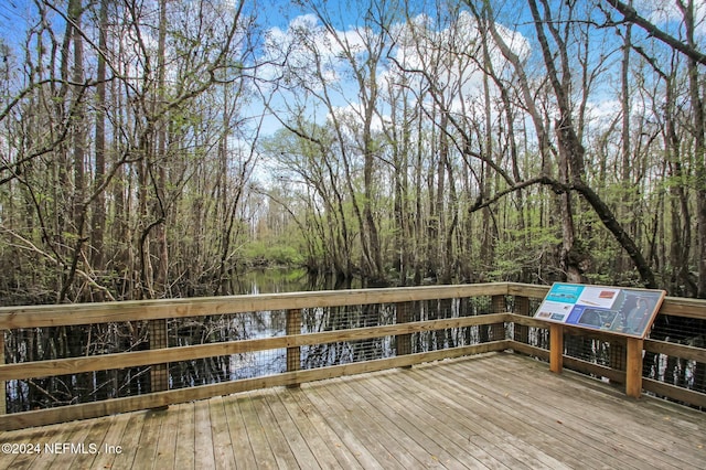 deck featuring a water view