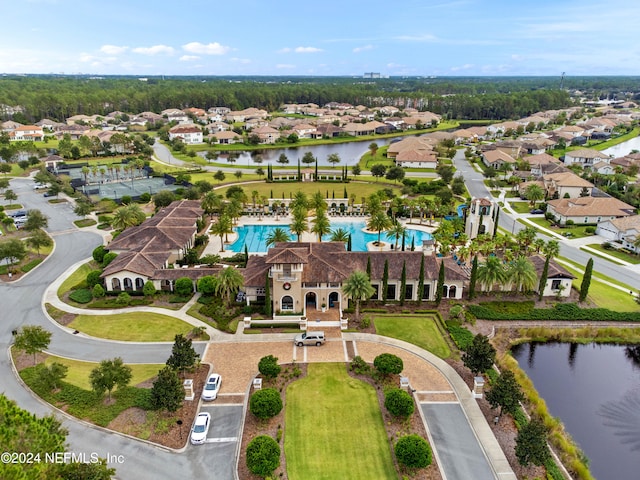 drone / aerial view with a water view